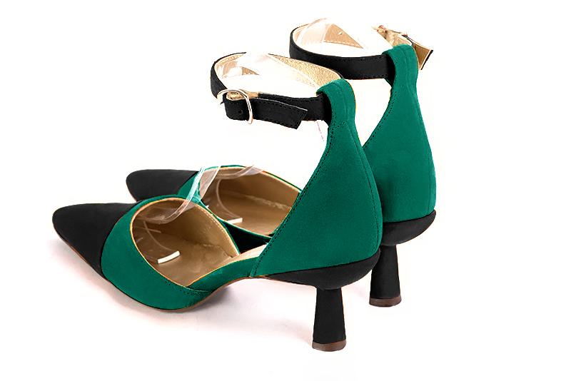 Matt black and emerald green women's open side shoes, with a strap around the ankle. Tapered toe. Medium spool heels. Rear view - Florence KOOIJMAN